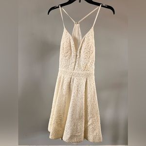 White, lace detail dress with built in support. Size M. Worn once!